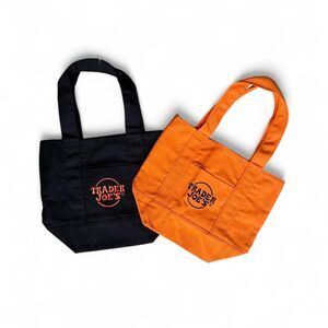 Trader Joe's orange and black reusable tote bags